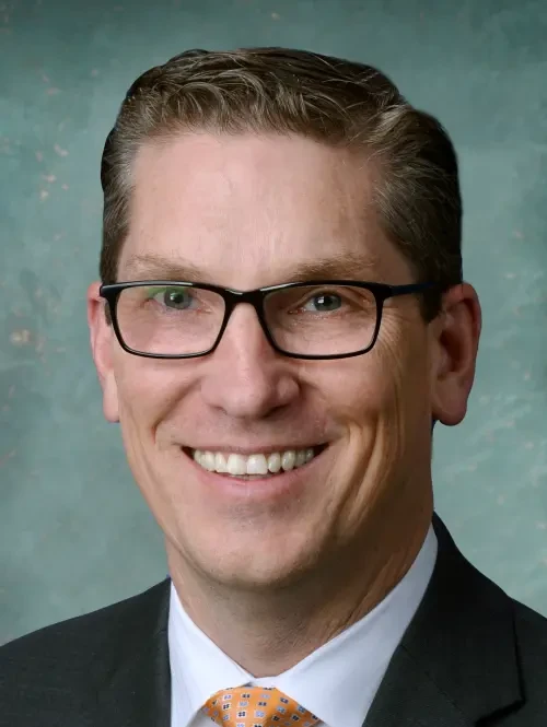 Mark E. Huizenga